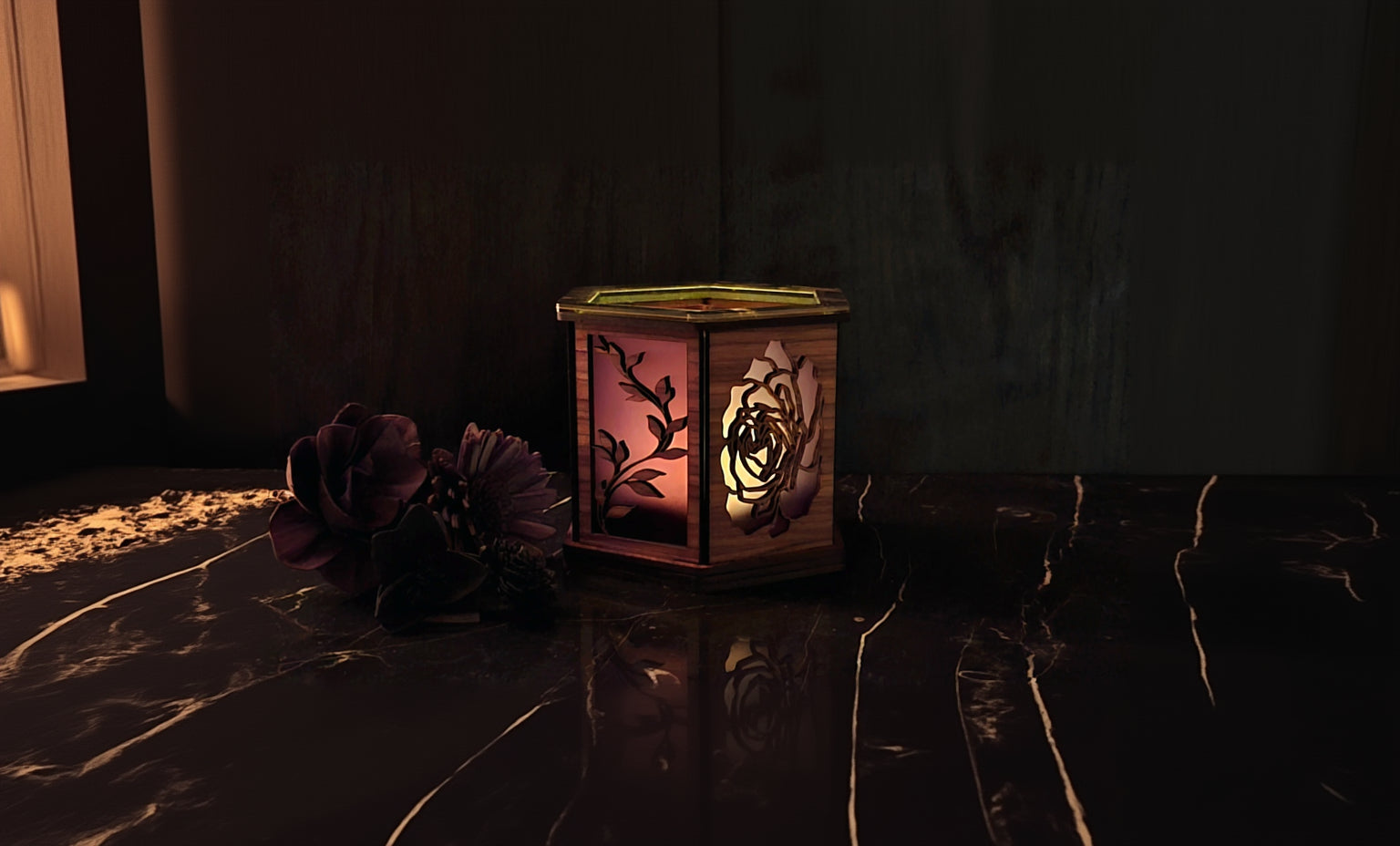 Wooden lantern with floral design on a dark background