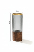 Decorative vase with wooden base and ribbed glass design, shown with measurements.