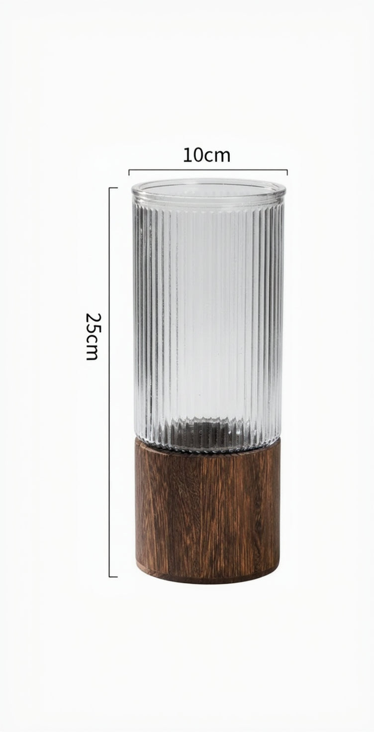 Decorative vase with wooden base and glass body, shown with measurements.
